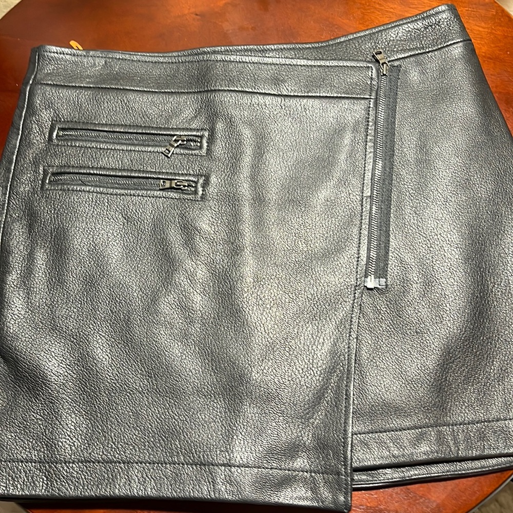 New without tags lamb leather black mini skirt.